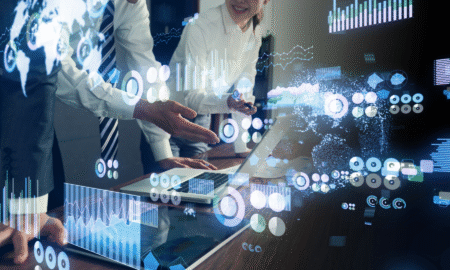 Bespoke Software Development Company in the UK with computers in background